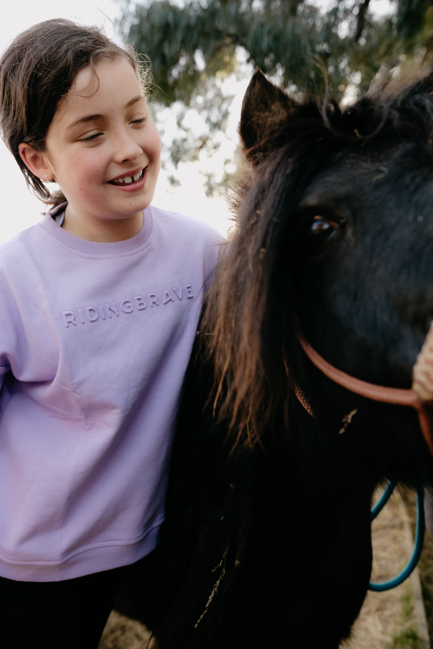 LILAC SIGNATURE RIDING BRAVE SWEATER
