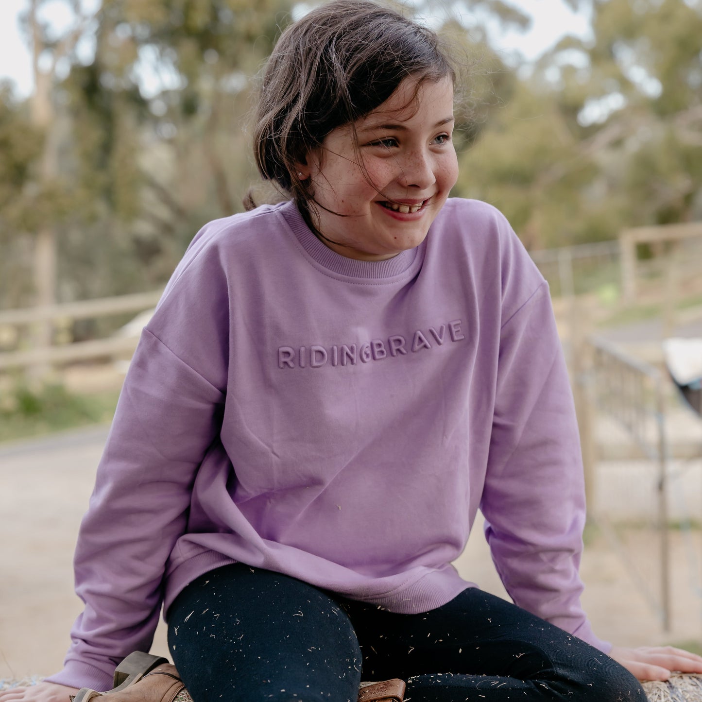 LILAC SIGNATURE RIDING BRAVE SWEATER