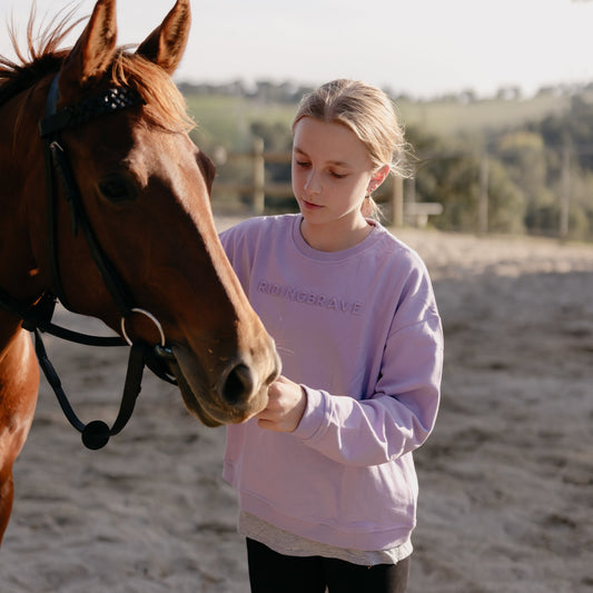 LILAC SIGNATURE RIDING BRAVE SWEATER